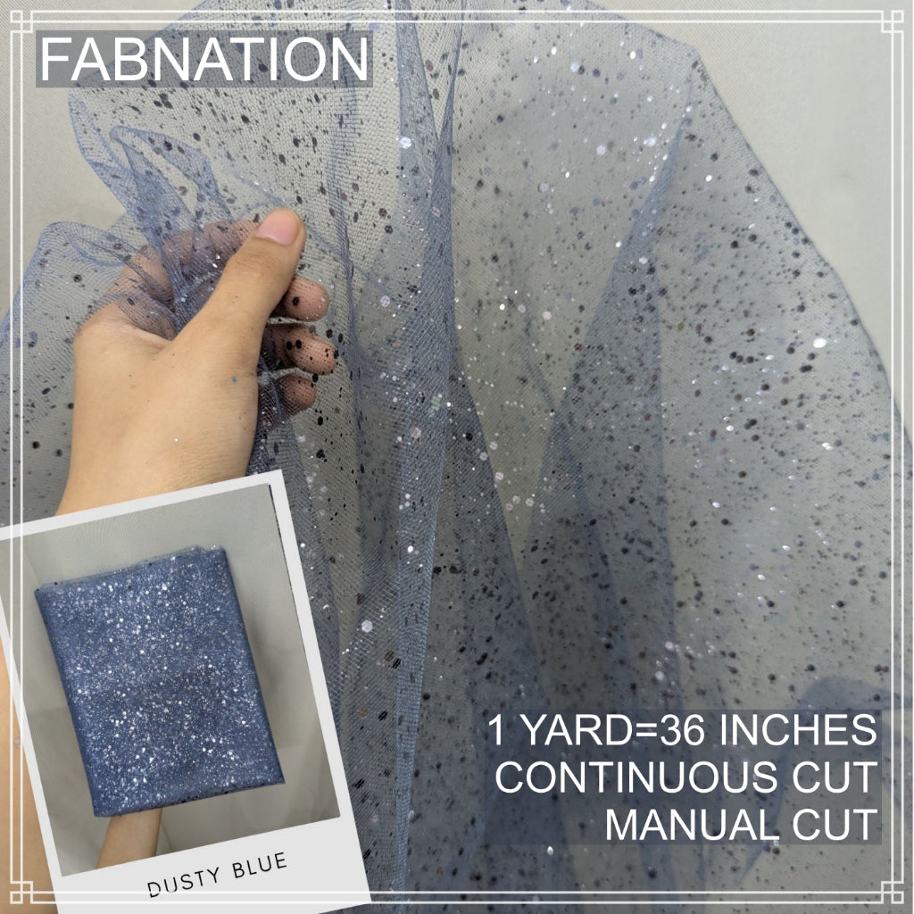 SILENKA GLITTERED TULLE WITH FALLING GLITTERS FABRIC PER YARD IS 36 INCHES LENGTH AND 60 FIXED WIDTH