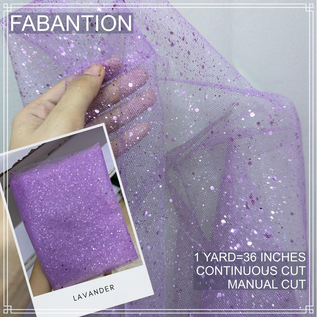 SILENKA GLITTERED TULLE WITH FALLING GLITTERS FABRIC PER YARD IS 36 INCHES LENGTH AND 60 FIXED WIDTH