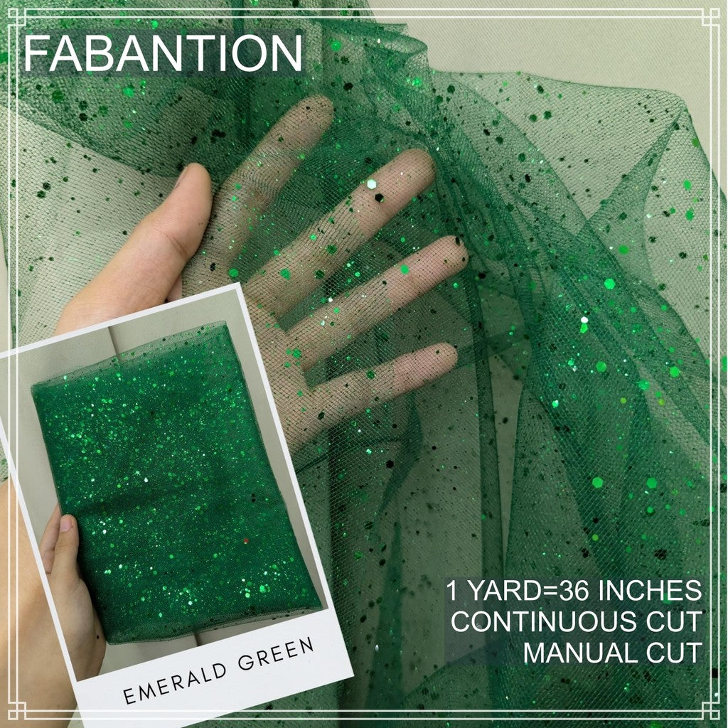 SILENKA GLITTERED TULLE WITH FALLING GLITTERS FABRIC PER YARD IS 36 INCHES LENGTH AND 60 FIXED WIDTH