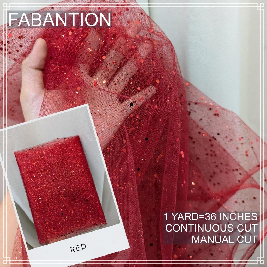 SILENKA GLITTERED TULLE WITH FALLING GLITTERS FABRIC PER YARD IS 36 INCHES LENGTH AND 60 FIXED WIDTH