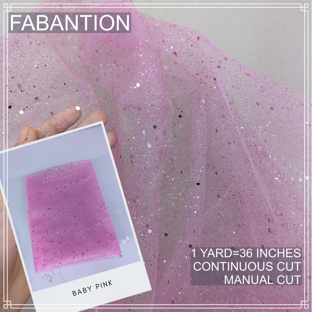SILENKA GLITTERED TULLE WITH FALLING GLITTERS FABRIC PER YARD IS 36 INCHES LENGTH AND 60 FIXED WIDTH