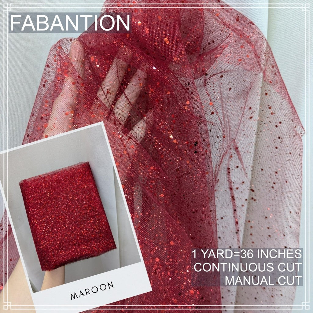 SILENKA GLITTERED TULLE WITH FALLING GLITTERS FABRIC PER YARD IS 36 INCHES LENGTH AND 60 FIXED WIDTH