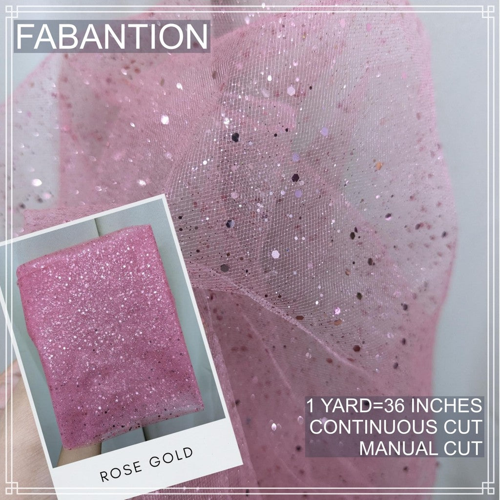 SILENKA GLITTERED TULLE WITH FALLING GLITTERS FABRIC PER YARD IS 36 INCHES LENGTH AND 60 FIXED WIDTH