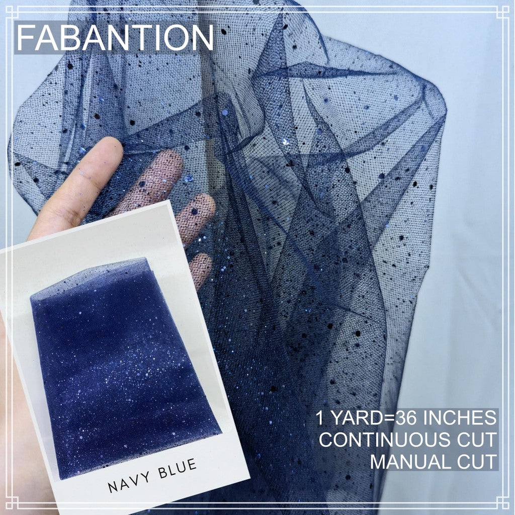 SILENKA GLITTERED TULLE WITH FALLING GLITTERS FABRIC PER YARD IS 36 INCHES LENGTH AND 60 FIXED WIDTH