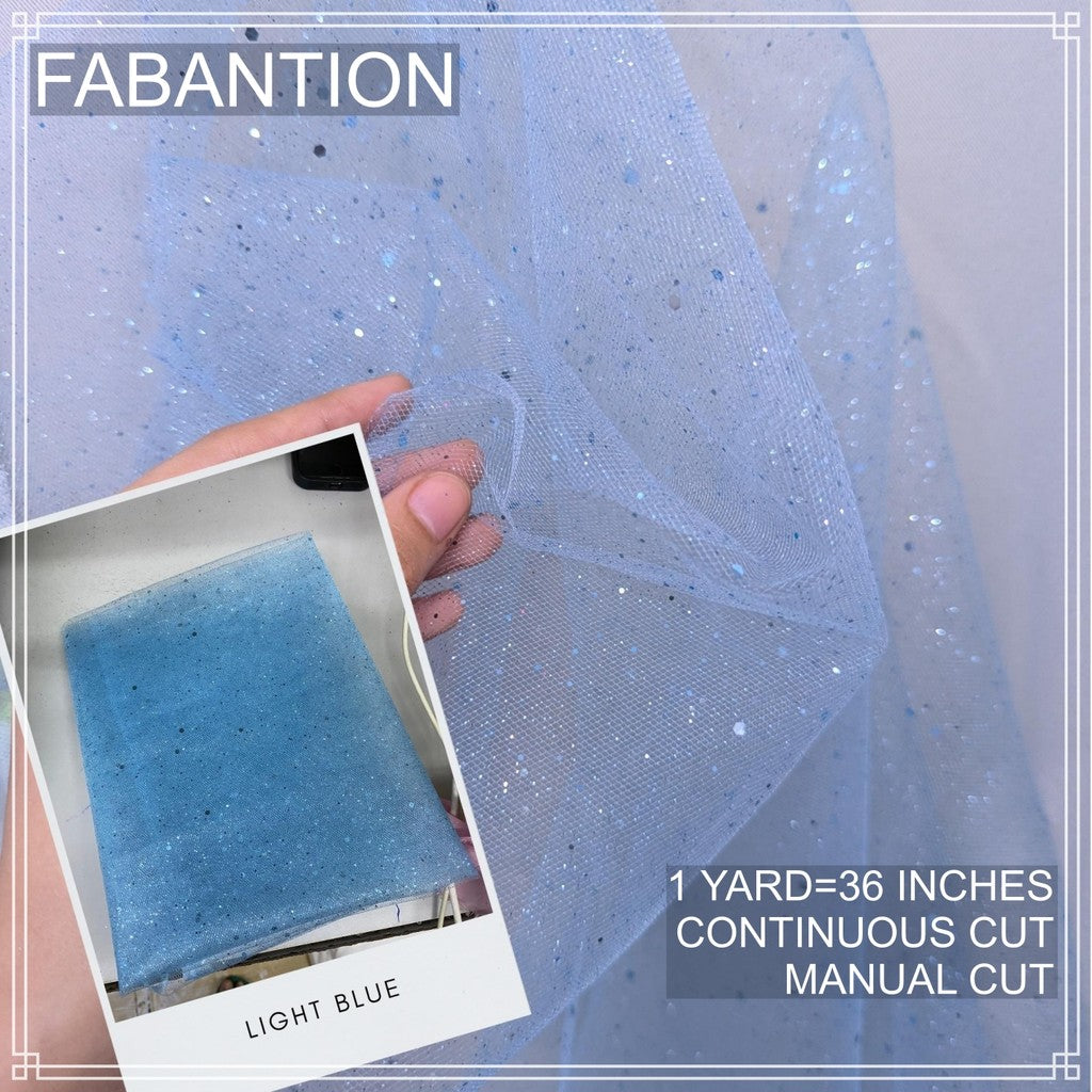 SILENKA GLITTERED TULLE WITH FALLING GLITTERS FABRIC PER YARD IS 36 INCHES LENGTH AND 60 FIXED WIDTH