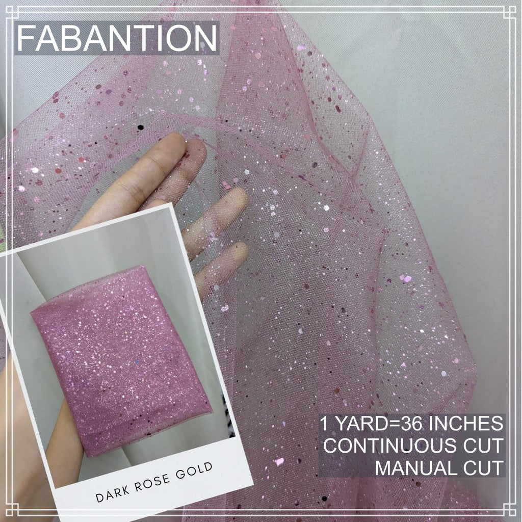SILENKA GLITTERED TULLE WITH FALLING GLITTERS FABRIC PER YARD IS 36 INCHES LENGTH AND 60 FIXED WIDTH