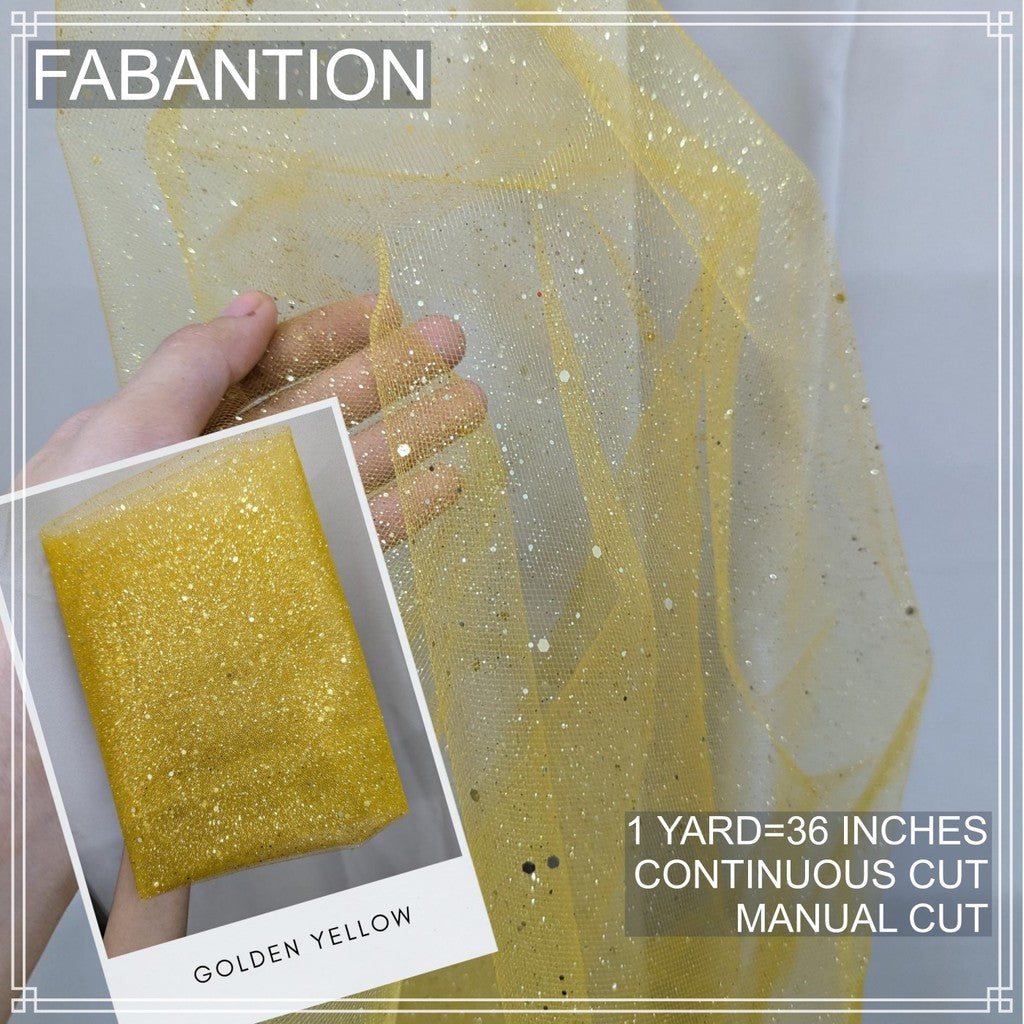 SILENKA GLITTERED TULLE WITH FALLING GLITTERS FABRIC PER YARD IS 36 INCHES LENGTH AND 60 FIXED WIDTH